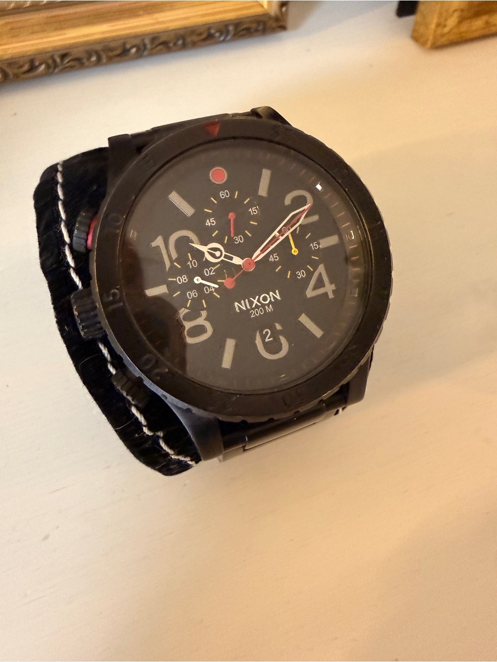 Nixon 48-20 Chronograph Men’s Watch with Red and Yellow Accents
